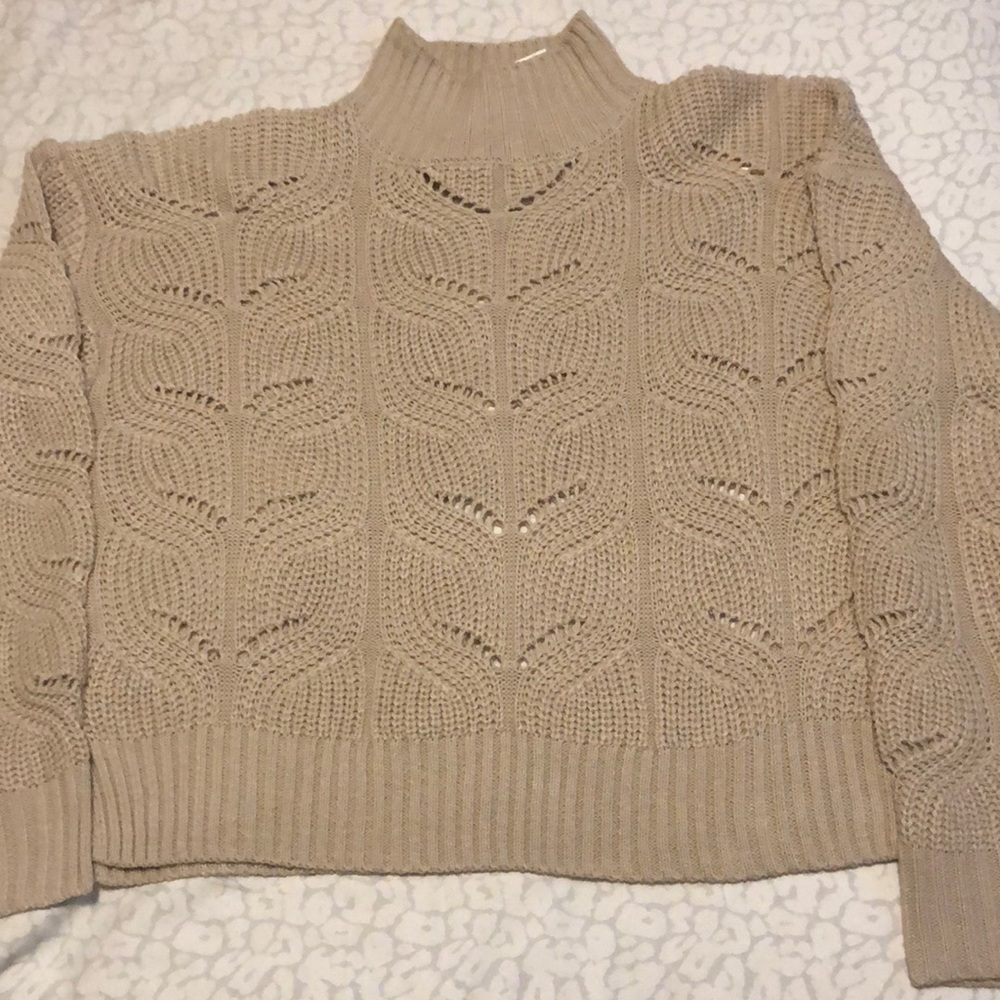 Beige cropped sweater. See through details. Size Large